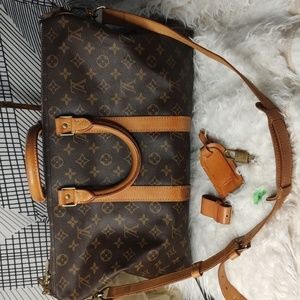 -SOLD-Authentic Louis Vuitton keepal 45 Bandolier with certificate